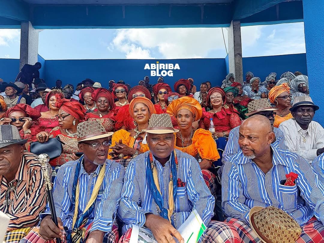 Women and men dressed in cultural attires at the grand civic reception for the Abriba event