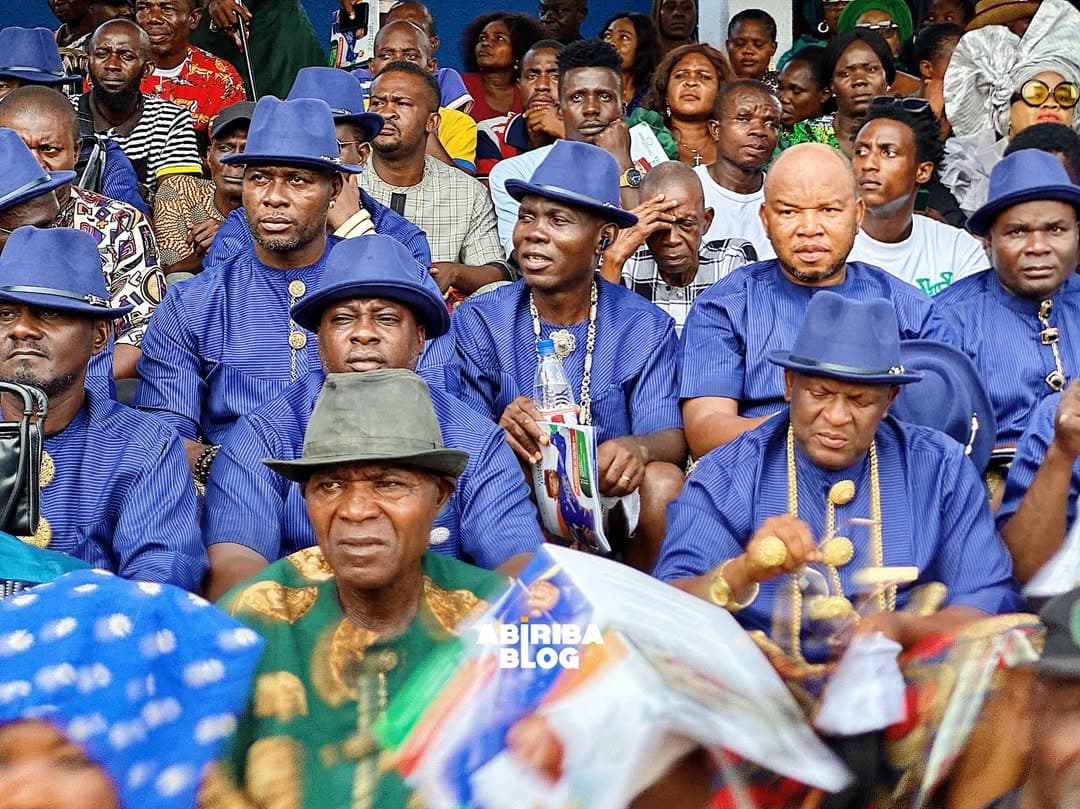 Women and men dressed in cultural attires at the grand civic reception for the Abriba event